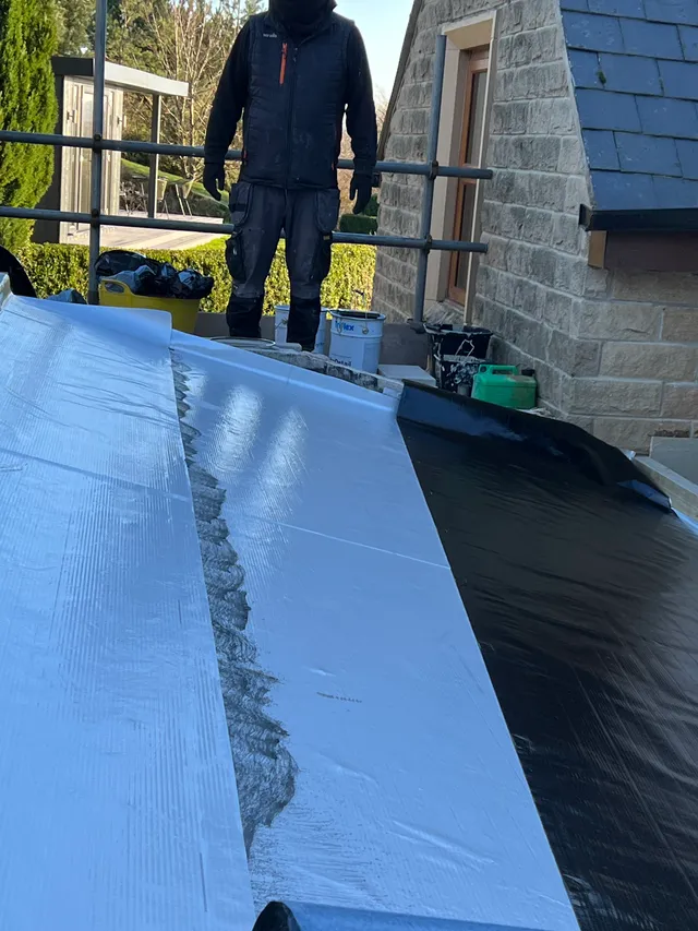 Roof and wall membrane detail