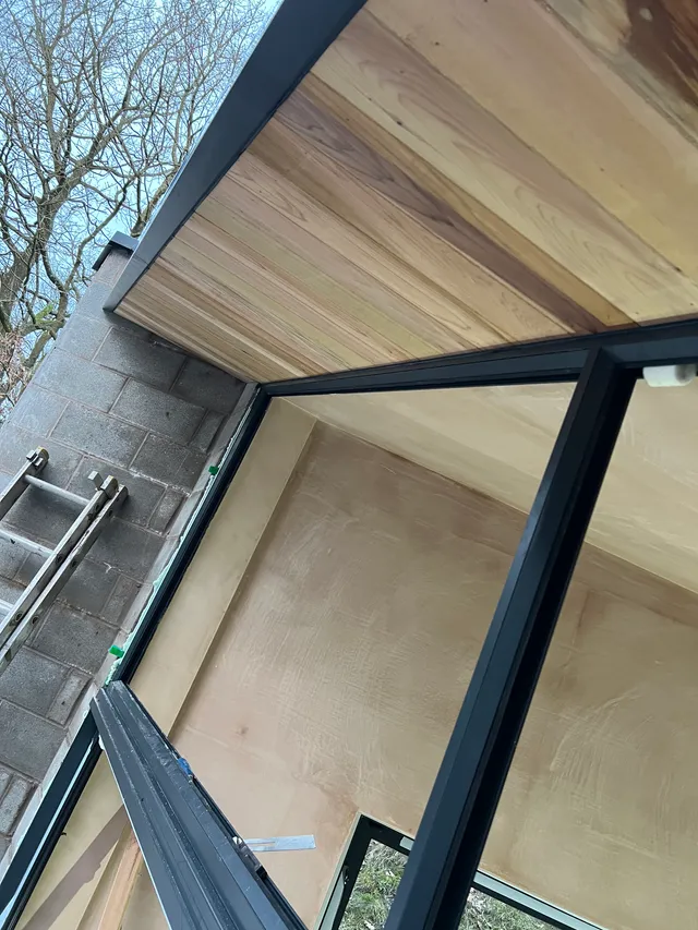 Timber-lined roof and glazing detail