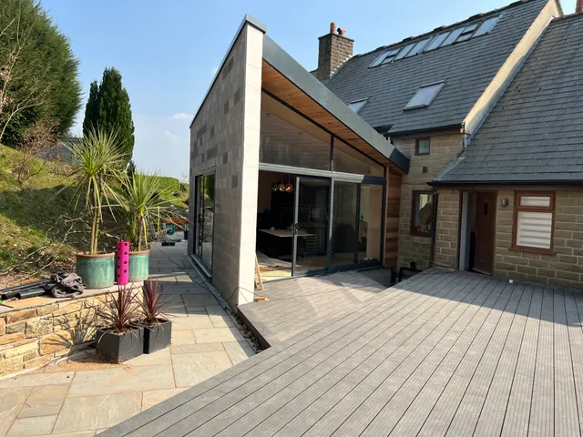 Completed extension, stone-clad elevation