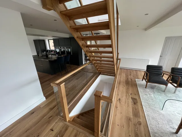 Staircase within the completed open-plan space